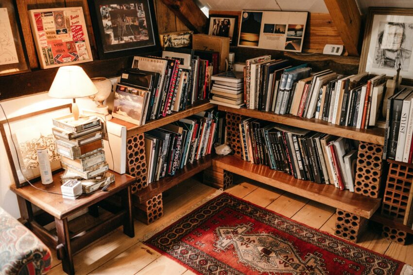 books on brown wooden shelf